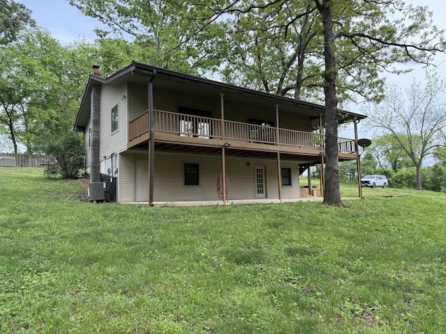 16709 Honeysuckle Hill Rd, Eminence, MO 65466 - rear view of house featuring a chimney, cooling unit, a yard, and a deck