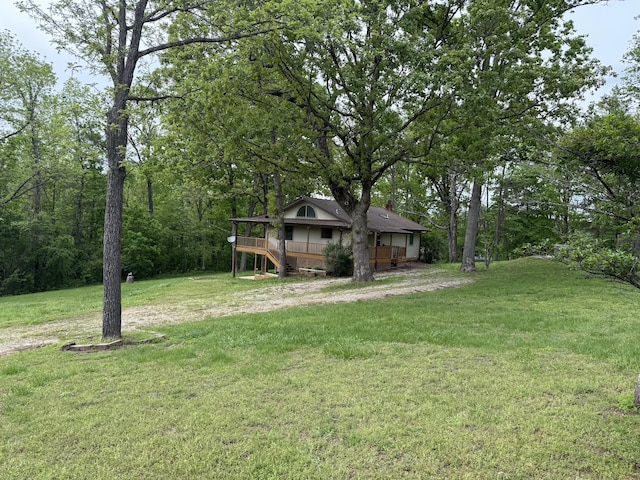 16709 Honeysuckle Hill Rd, Eminence, MO 65466 - view of green lawn featuring a wooden deck and stairway