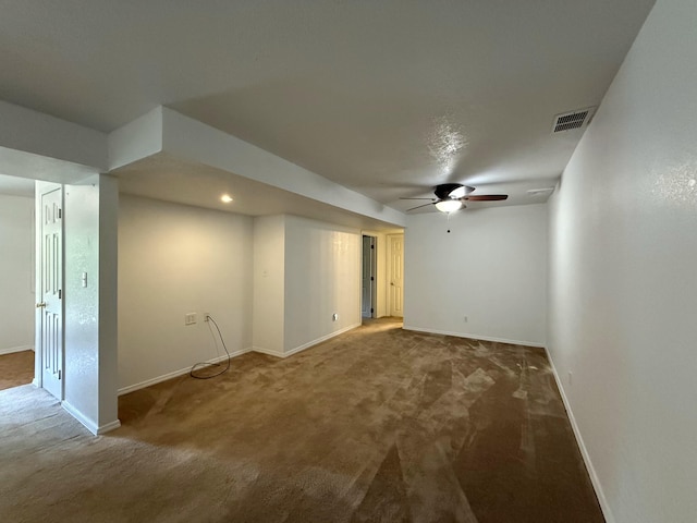 16709 Honeysuckle Hill Rd, Eminence, MO 65466 - basement featuring ceiling fan, carpet, and baseboards