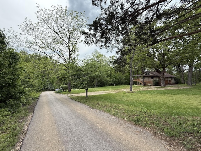 16709 Honeysuckle Hill Rd, Eminence, MO 65466 - view of asphalt street featuring a forest view