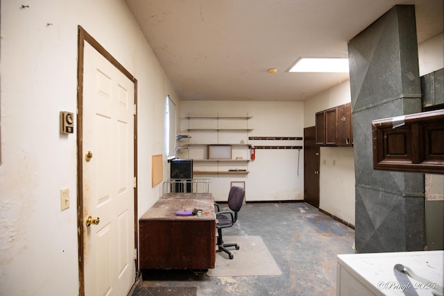 office space with concrete floors