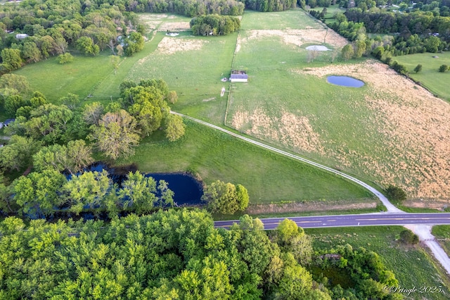 aerial view of property and surrounding area with rural landscape