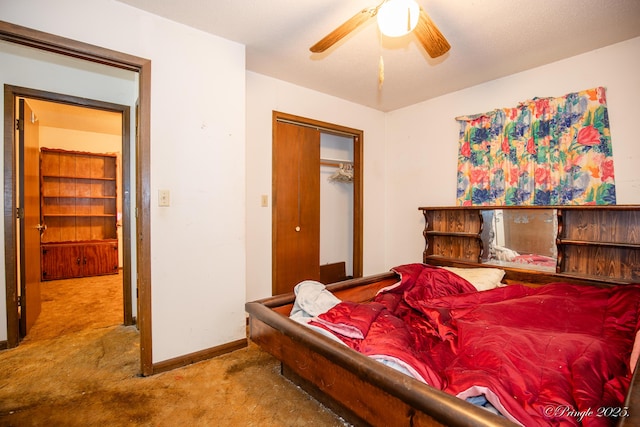 bedroom with carpet, baseboards, a ceiling fan, and a closet