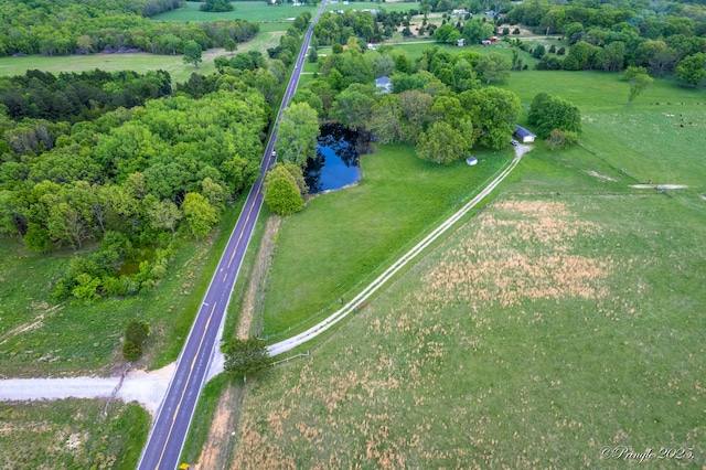 aerial overview of property's location with a nearby body of water