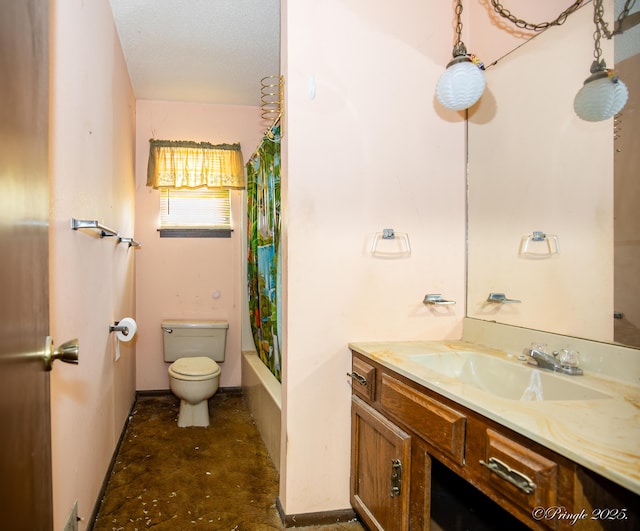 bathroom featuring toilet, vanity, and shower / bath combination with curtain
