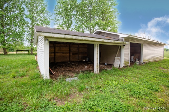 garage featuring fence