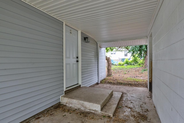 view of patio / terrace with an attached carport
