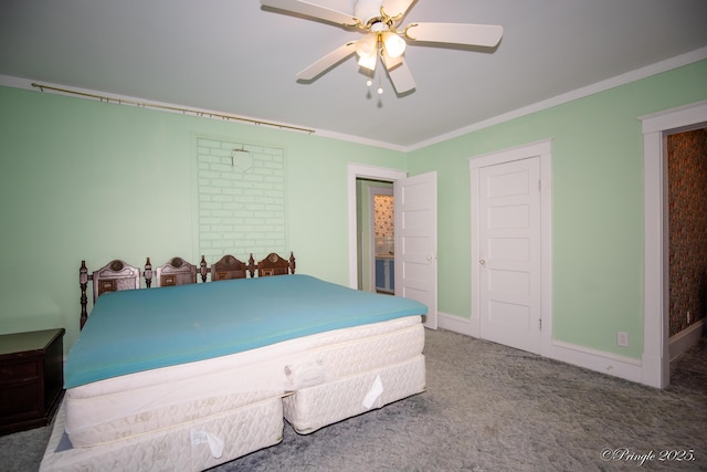 carpeted bedroom with crown molding, ceiling fan, and baseboards
