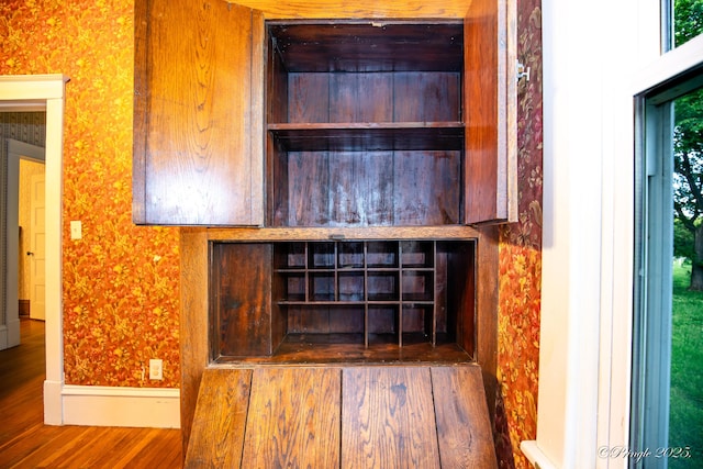 detailed view of wood finished floors and baseboards