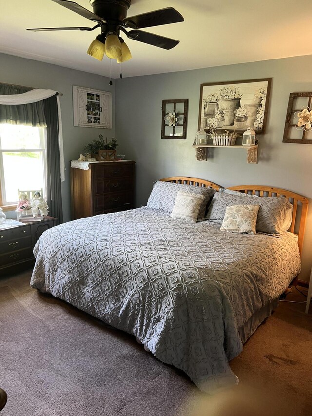 bedroom featuring carpet and a ceiling fan