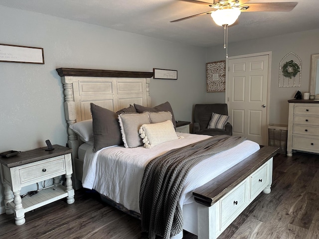313 Washington St, Mountain View, MO 65548 - bedroom featuring dark wood-type flooring and a ceiling fan