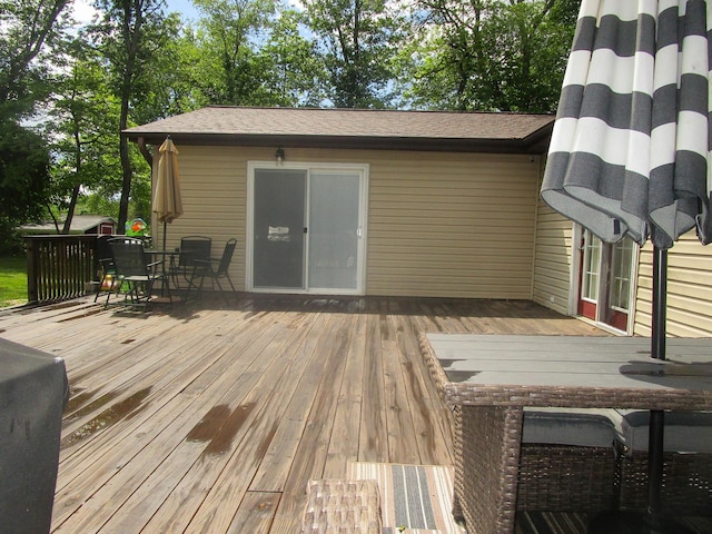 313 Washington St, Mountain View, MO 65548 - wooden terrace with outdoor dining area