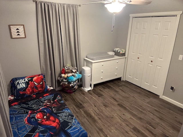 313 Washington St, Mountain View, MO 65548 - bedroom with dark wood-style flooring, a ceiling fan, and baseboards