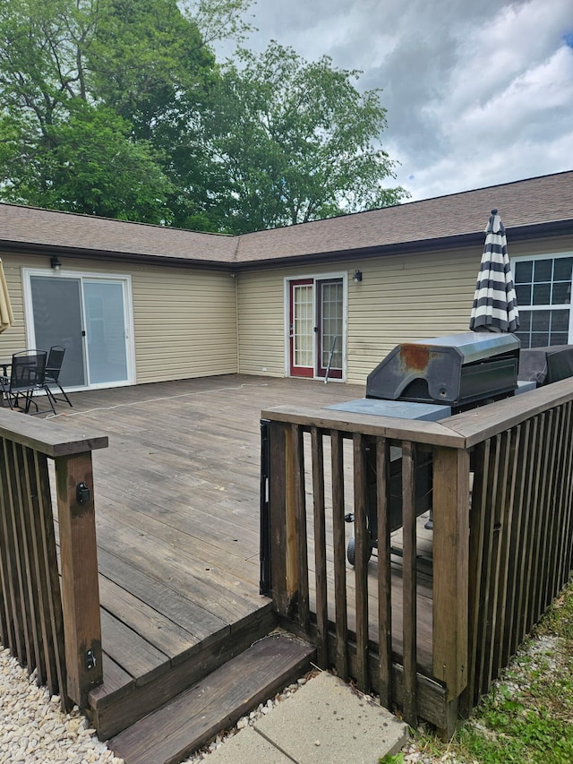 313 Washington St, Mountain View, MO 65548 - wooden deck with outdoor dining area
