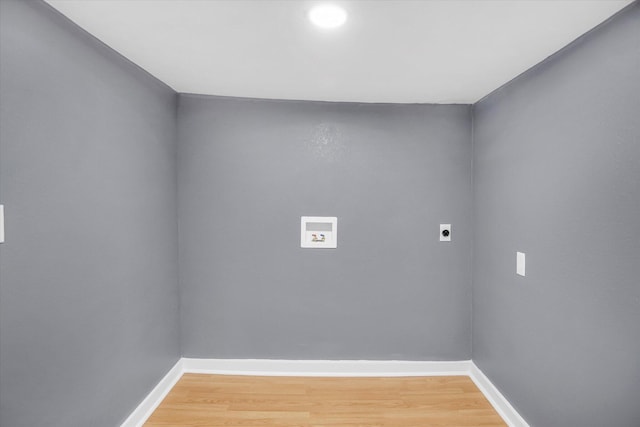 2041 N Pickwick Ave, Springfield, MO 65803 - laundry room featuring electric dryer hookup, washer hookup, light wood-type flooring, and baseboards