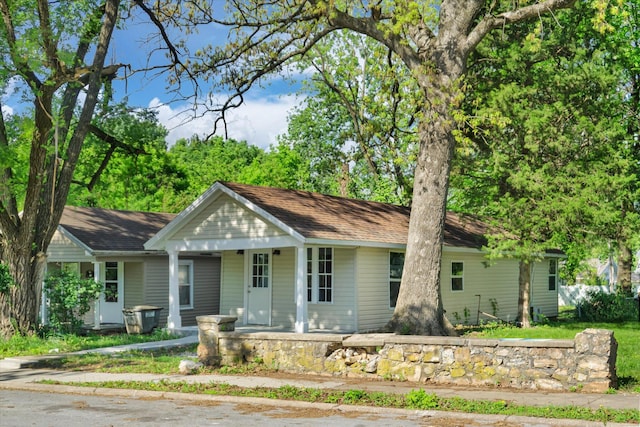 2041 N Pickwick Ave, Springfield, MO 65803 - view of front facade featuring covered porch and roof with shingles