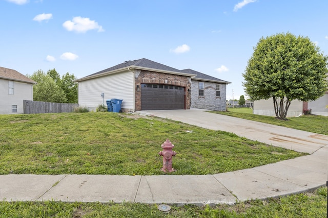 view of front facade with driveway, a garage, and brick siding