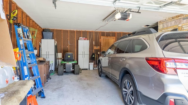 920 Oak St, Thayer, MO 65791 - garage with a garage door opener