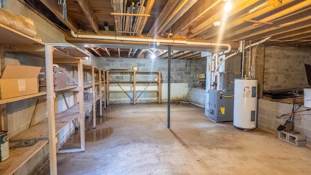 920 Oak St, Thayer, MO 65791 - unfinished below grade area with electric water heater and heating unit