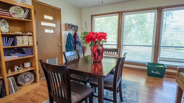 920 Oak St, Thayer, MO 65791 - dining area featuring wood finished floors and healthy amount of natural light
