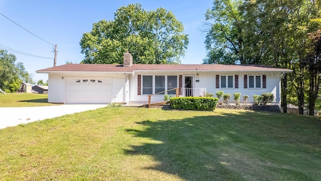920 Oak St, Thayer, MO 65791 - ranch-style house with an attached garage, concrete driveway, a chimney, and a front lawn