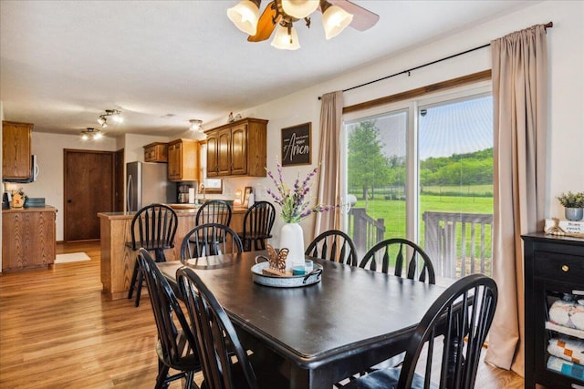 1215 E 515th Rd, Morrisville, MO 65710 - dining room featuring plenty of natural light, light wood-style floors, and ceiling fan
