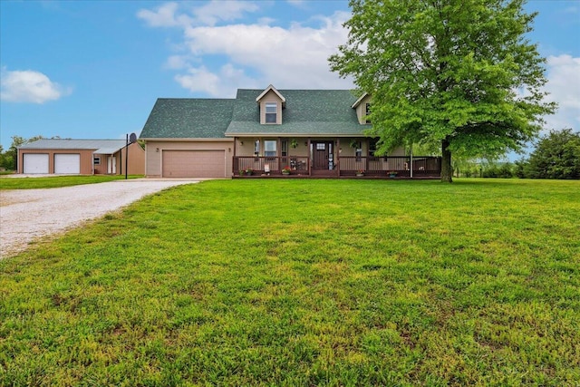 1215 E 515th Rd, Morrisville, MO 65710 - view of front facade with gravel driveway, a front lawn, and a garage