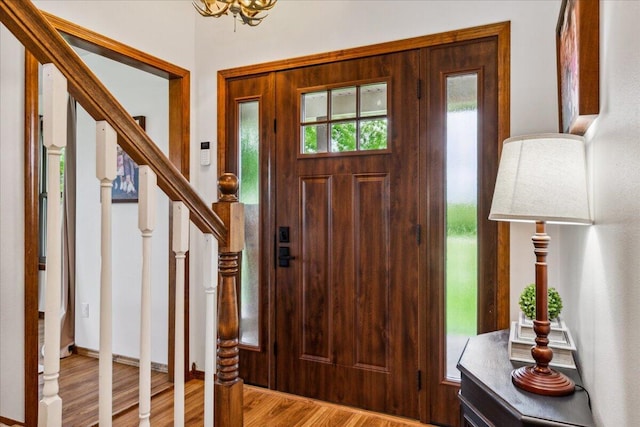 1215 E 515th Rd, Morrisville, MO 65710 - foyer entrance with wood finished floors and stairs