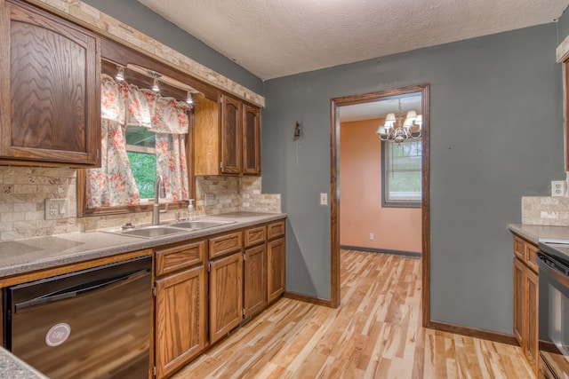 713 Taneycomo Rd, Branson, MO 65616 - kitchen with dishwasher, a sink, light wood-type flooring, brown cabinetry, and tasteful backsplash