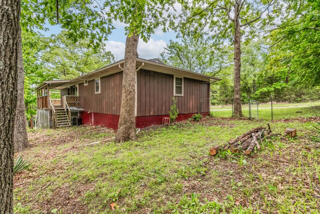 713 Taneycomo Rd, Branson, MO 65616 - view of home's exterior featuring stairway and a deck