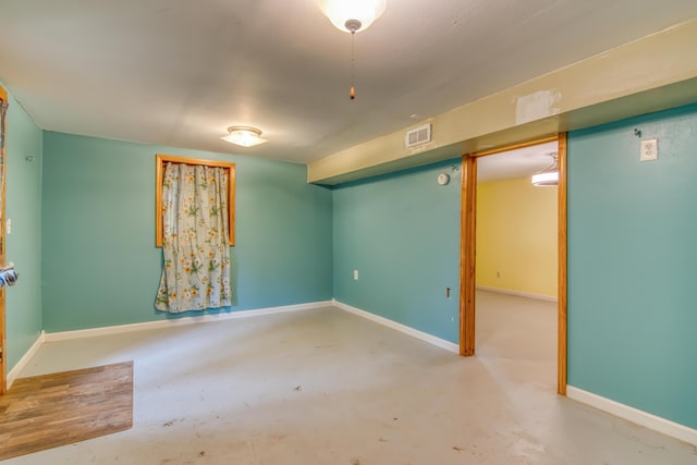713 Taneycomo Rd, Branson, MO 65616 - empty room featuring concrete flooring and baseboards