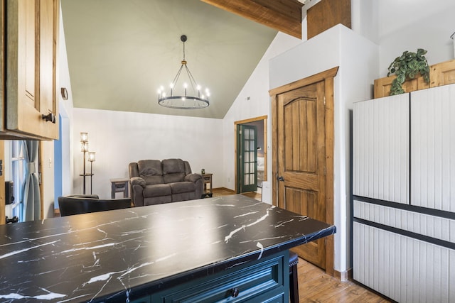 1226 Peace In Valley Rd, Blue Eye, MO 65611 - playroom featuring a chandelier, wood finished floors, beamed ceiling, and high vaulted ceiling
