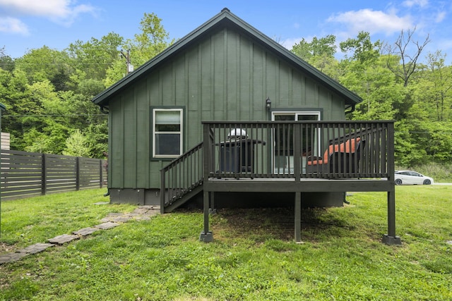 1226 Peace In Valley Rd, Blue Eye, MO 65611 - back of property with a wooden deck and board and batten siding