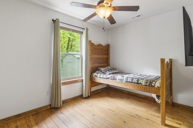 1226 Peace In Valley Rd, Blue Eye, MO 65611 - bedroom featuring light wood-type flooring, baseboards, and ceiling fan