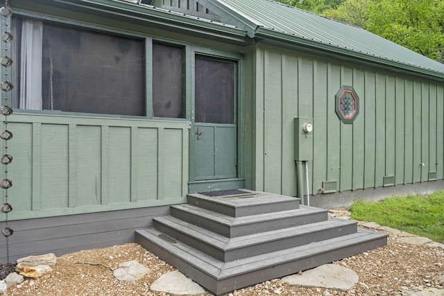 1226 Peace In Valley Rd, Blue Eye, MO 65611 - exterior view of entry steps and board and batten siding