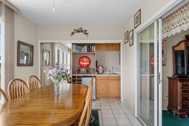 351 Wildwood Dr S Unit 5, Branson, MO 65616 - dining area featuring light tile patterned flooring and wet bar