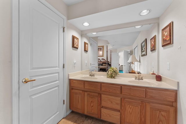 351 Wildwood Dr S Unit 5, Branson, MO 65616 - ensuite bathroom featuring double vanity and recessed lighting
