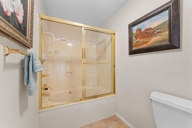 351 Wildwood Dr S Unit 5, Branson, MO 65616 - bathroom with shower / bath combination with glass door, toilet, stone finish floors, and baseboards