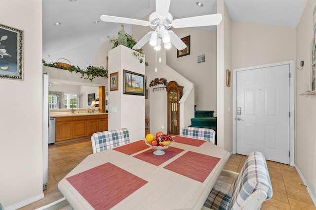 351 Wildwood Dr S Unit 5, Branson, MO 65616 - dining area with high vaulted ceiling, stairway, a ceiling fan, baseboards, and recessed lighting