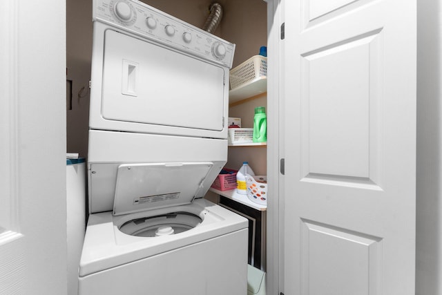 680 Emerald Pointe Dr Unit 6, Hollister, MO 65672 - laundry area with stacked washer / drying machine