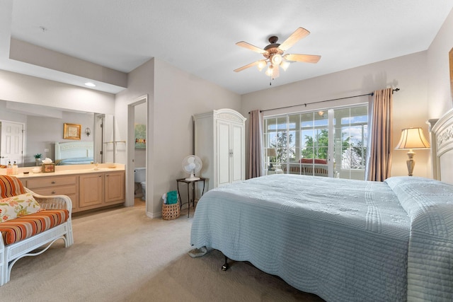 680 Emerald Pointe Dr Unit 6, Hollister, MO 65672 - bedroom with light colored carpet, ensuite bath, ceiling fan, recessed lighting, and baseboards