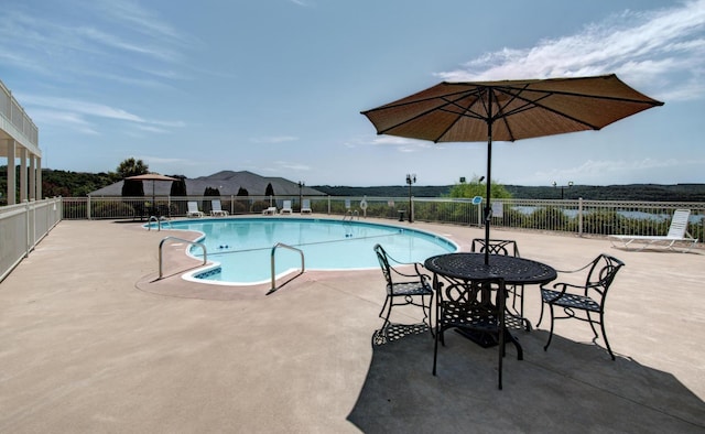 680 Emerald Pointe Dr Unit 6, Hollister, MO 65672 - community pool with fence and a patio area