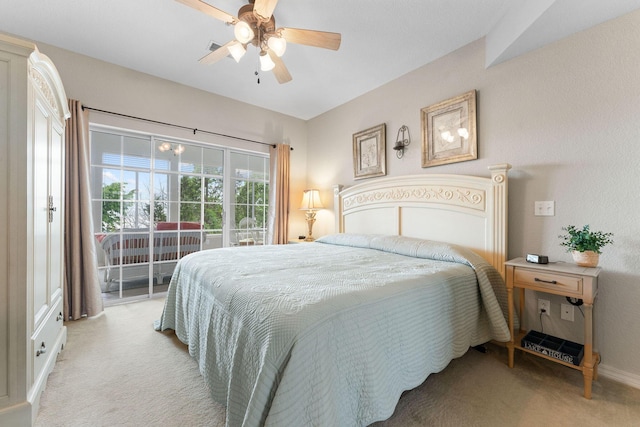 680 Emerald Pointe Dr Unit 6, Hollister, MO 65672 - bedroom with light carpet, access to outside, and a ceiling fan