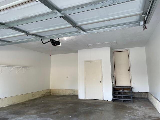 1627 W Lindberg St, Springfield, MO 65807 - garage with a garage door opener