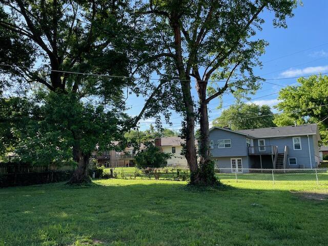1627 W Lindberg St, Springfield, MO 65807 - view of yard featuring a deck