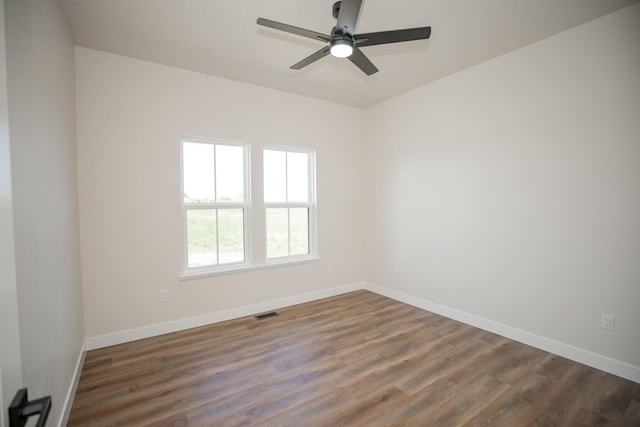 13320 E 1424th Rd, Stockton, MO 65785 - empty room with baseboards, dark wood-style floors, and ceiling fan