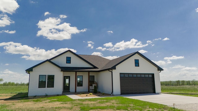13320 E 1424th Rd, Stockton, MO 65785 - modern inspired farmhouse featuring driveway and a garage