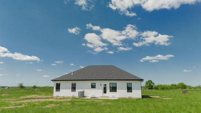 13320 E 1424th Rd, Stockton, MO 65785 - back of property featuring central AC unit and a yard