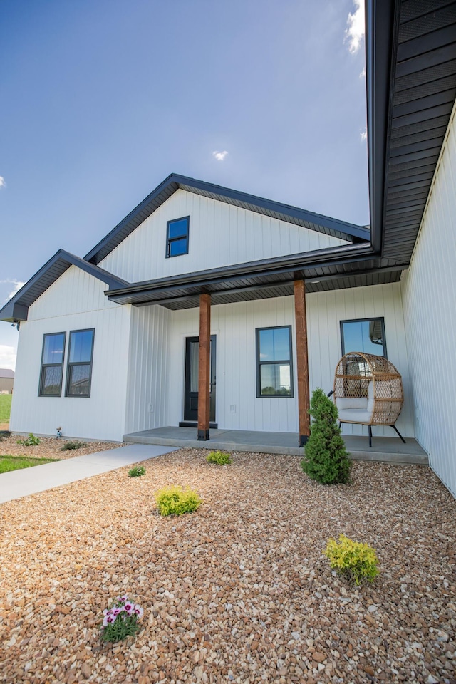 13320 E 1424th Rd, Stockton, MO 65785 - view of front of house with covered porch