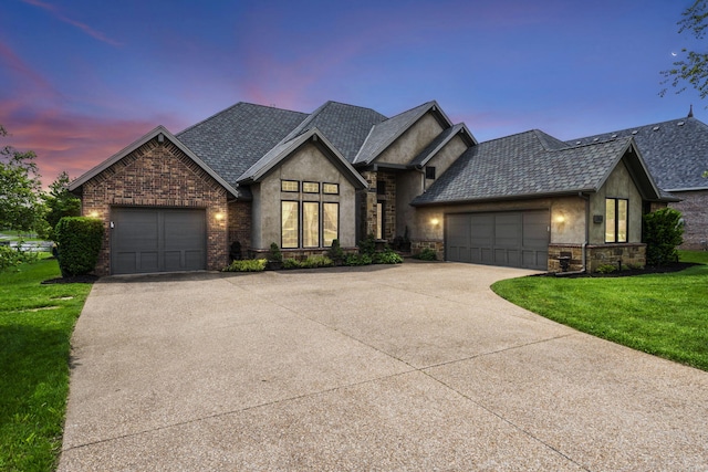 3260 W Rivulet Pass, Springfield, MO 65810 - view of front facade featuring stone siding, concrete driveway, a front yard, and an attached garage